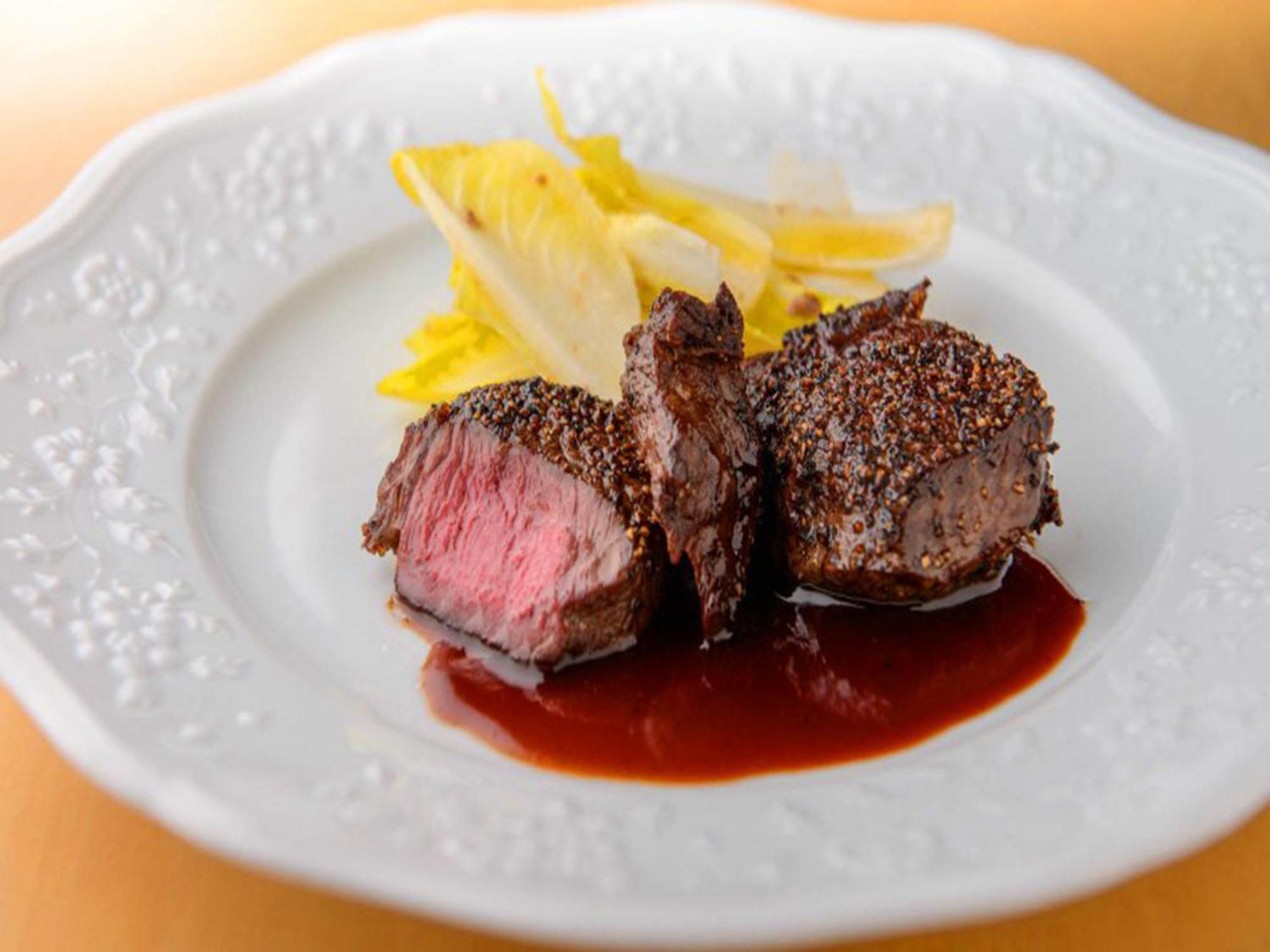 Shin Furano Prince Hotel Екстериор снимка A steak prepared using the dry-aging technique